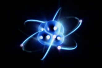 zoom in out of atom with electron orbiting nucleus blue n15 6aggx F0000