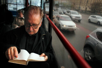 passenger reads a book ap 100422119642 b