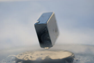 Levitation of a magnet on top of a superconductor 2